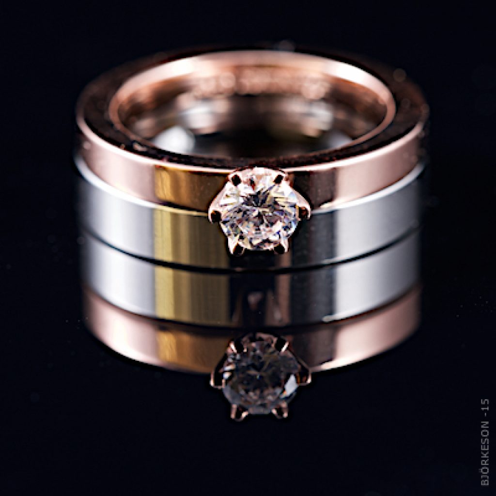 Enstensring rosé med slät ring i vitguld